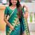 Green ethnic motifs woven design zari detail paithani saree