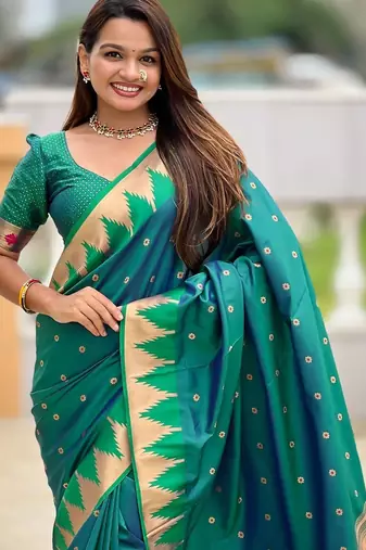 Green ethnic motifs woven design zari detail paithani saree
