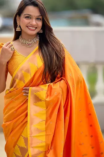 Orange women woven design zari paithni saree