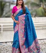 Blue ethnic motifs printed woven design border zari saree