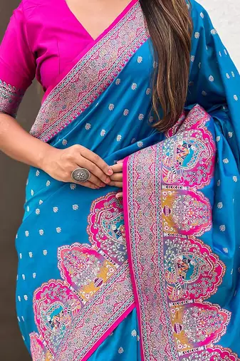 Blue ethnic motifs printed woven design border zari saree