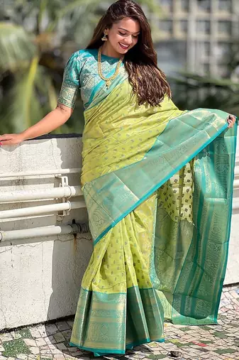 Green woven design zari silk blend kanjeevaram saree