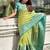 Green woven design zari silk blend kanjeevaram saree