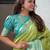 Green woven design zari silk blend kanjeevaram saree