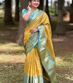 Yellow woven design zari silk blend kanjeevaram saree