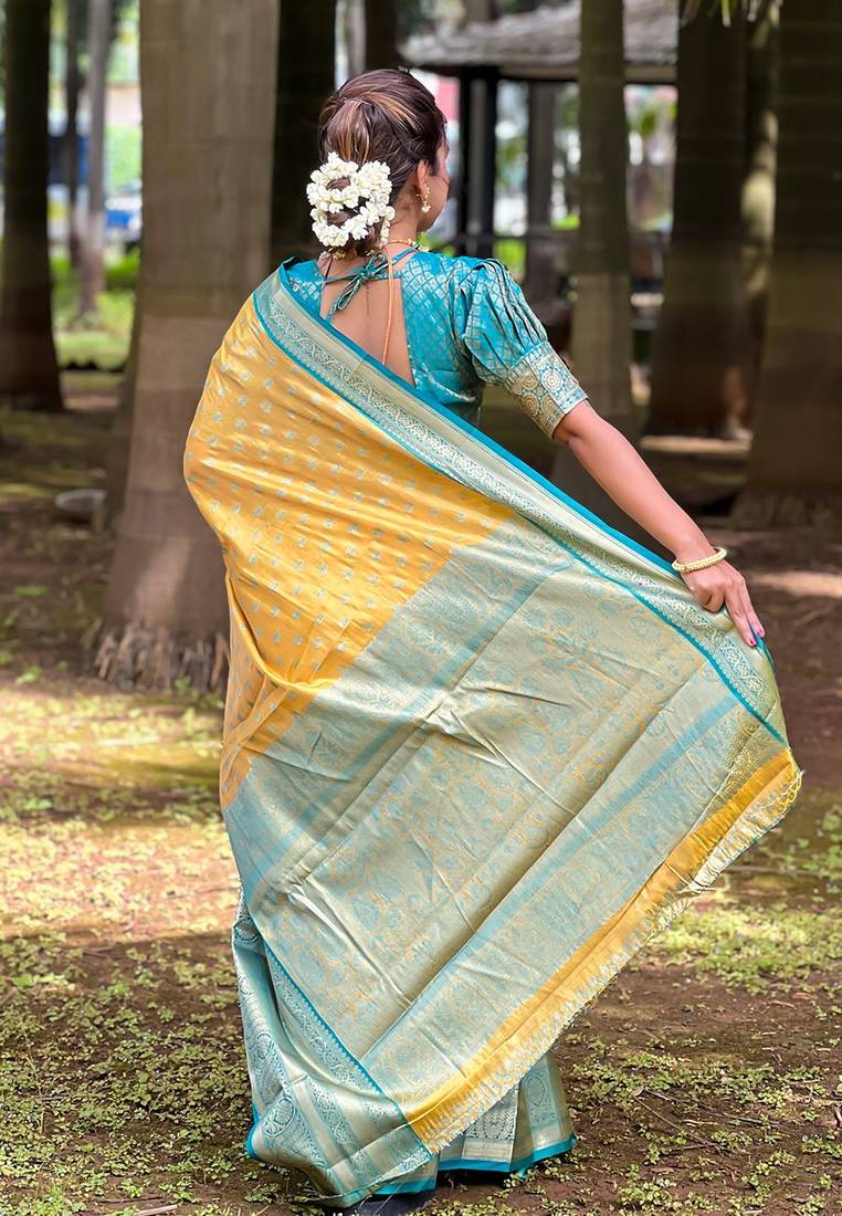 Yellow woven design zari silk blend kanjeevaram saree