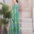 Green beads and stones organza saree