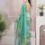 Green beads and stones organza saree