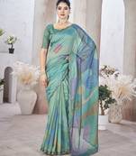 Turquoise abstract printed organza saree
