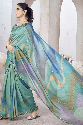 Turquoise abstract printed organza saree