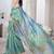 Turquoise abstract printed organza saree