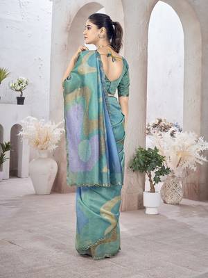 Turquoise abstract printed organza saree 3