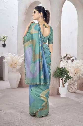 Turquoise abstract printed organza saree
