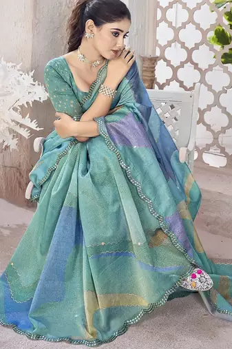 Turquoise abstract printed organza saree