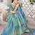 Turquoise abstract printed organza saree