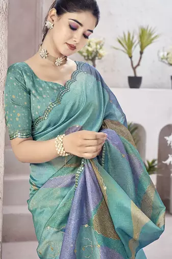 Turquoise abstract printed organza saree