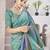 Turquoise abstract printed organza saree