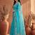 Turquoise embroidered organza saree