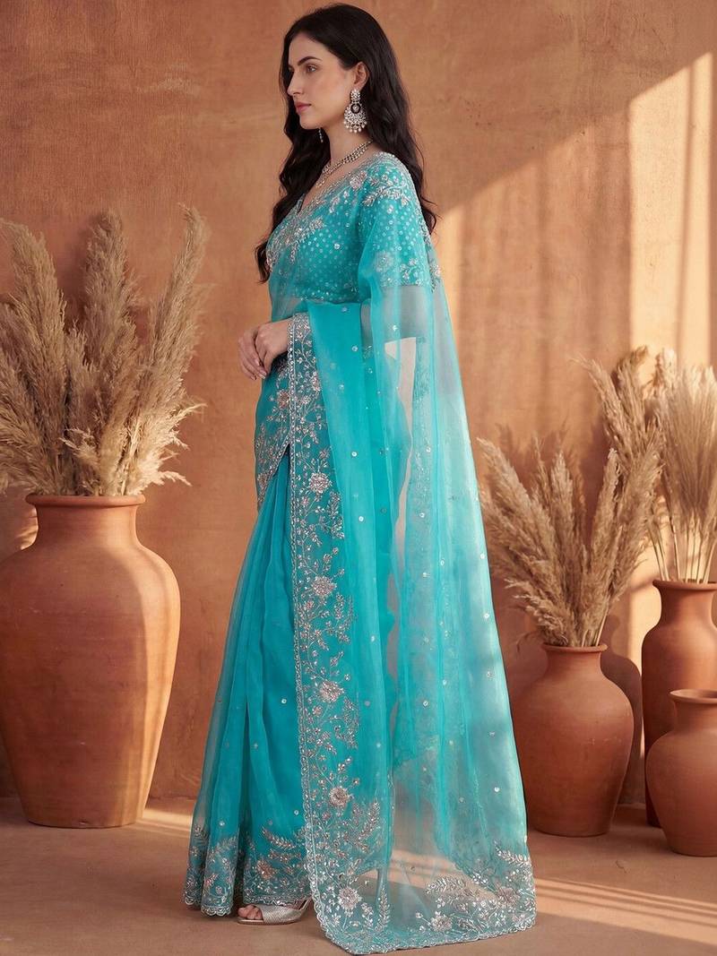Turquoise embroidered organza saree