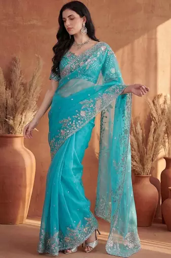 Turquoise embroidered organza saree