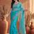 Turquoise embroidered organza saree