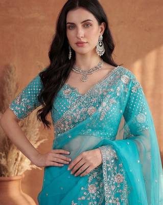 Turquoise embroidered organza saree 4