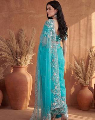 Turquoise embroidered organza saree 5