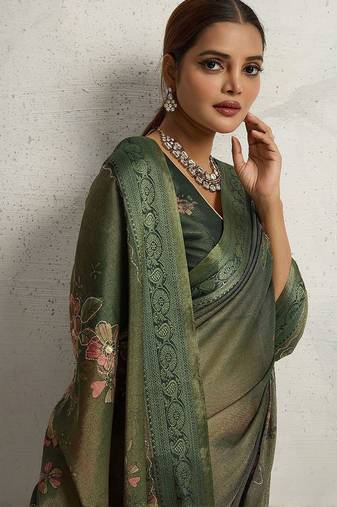 Green floral embellished woven design zari tissue saree