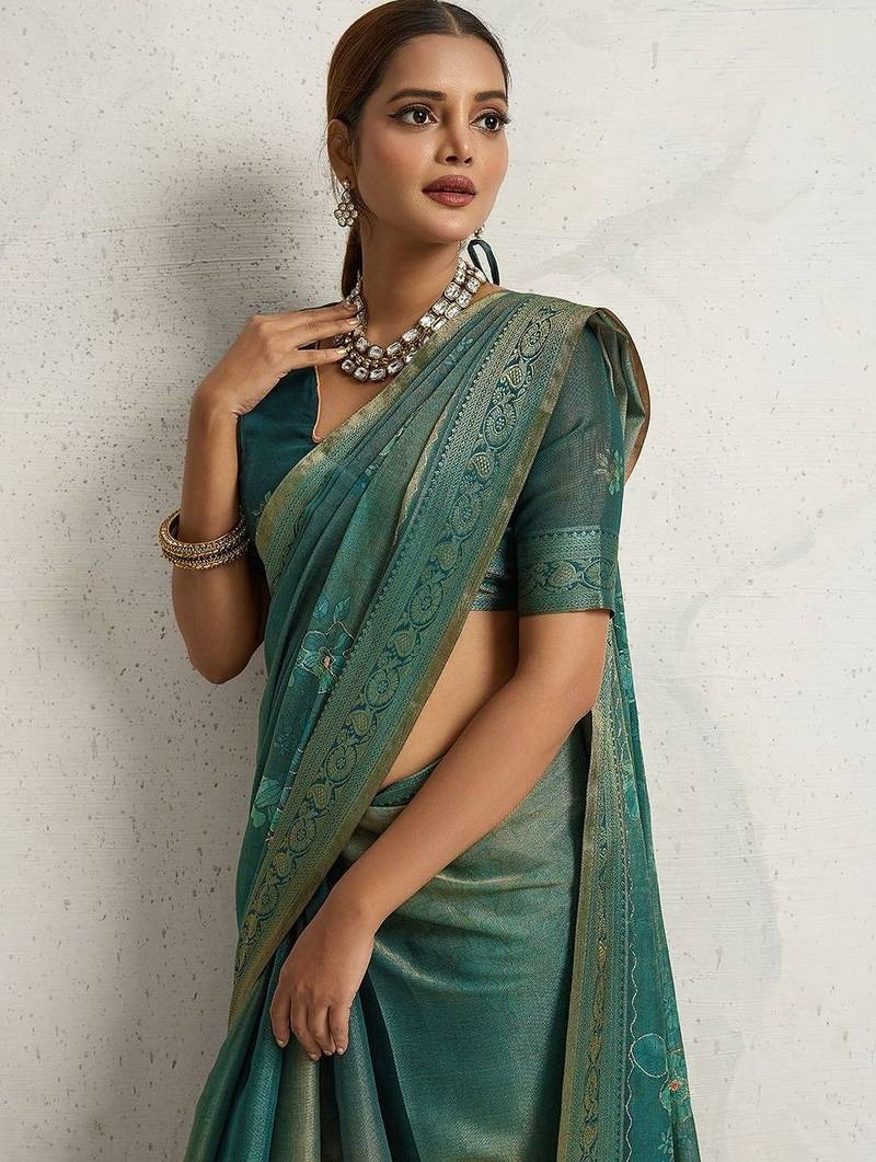 Teal floral printed sequinned tissue saree
