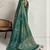 Teal floral printed sequinned tissue saree