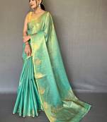 Sea green ethnic motifs woven design zari tissue kanjeevaram saree