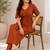 Women's rust solid short sleeve top with elastic waist trousers co-ord