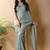 Sea green poly georgette saree