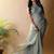 Sea green poly georgette saree