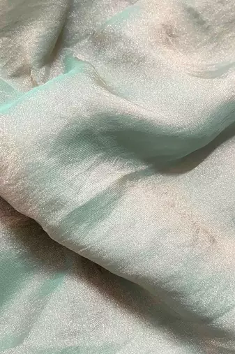 Sea green poly georgette saree
