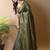 Olive woven design tissue saree