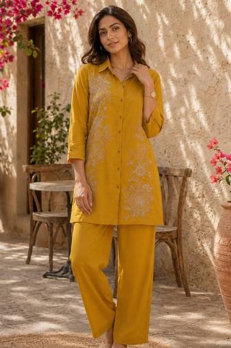 Women's yellow ethnic motif embroidered tunic with straight fit trousers