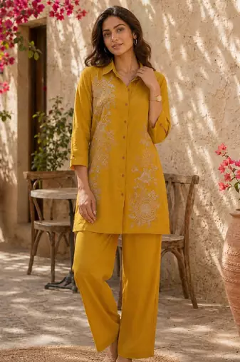 Women's yellow ethnic motif embroidered tunic with straight fit trousers