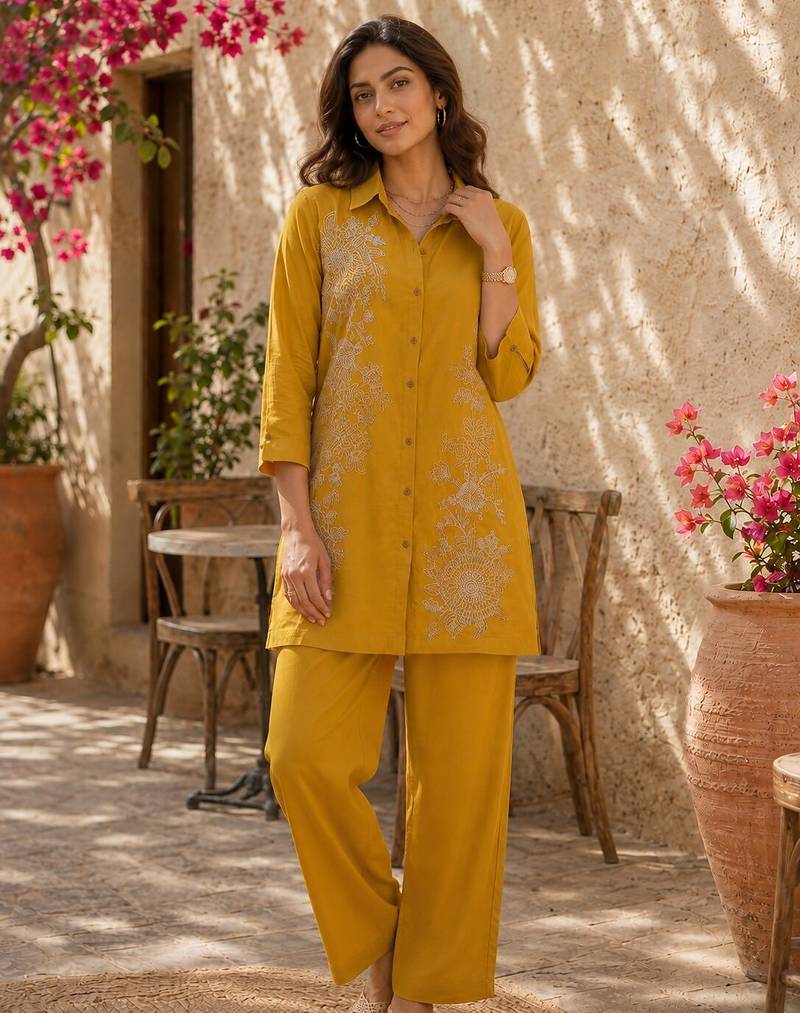Women's yellow ethnic motif embroidered tunic with straight fit trousers