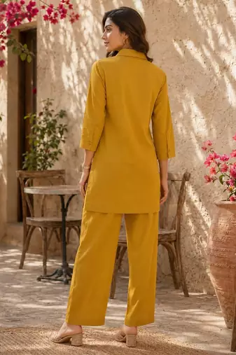 Women's yellow ethnic motif embroidered tunic with straight fit trousers