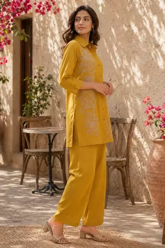 Women's yellow ethnic motif embroidered tunic with straight fit trousers