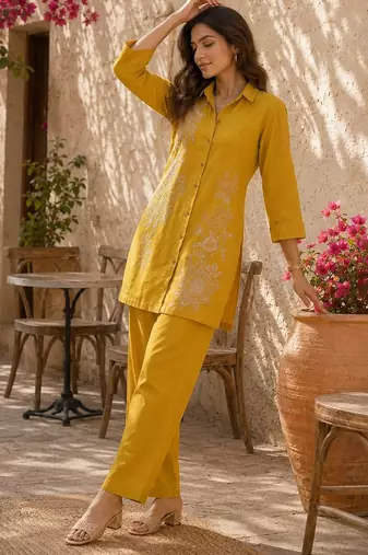 Women's yellow ethnic motif embroidered tunic with straight fit trousers