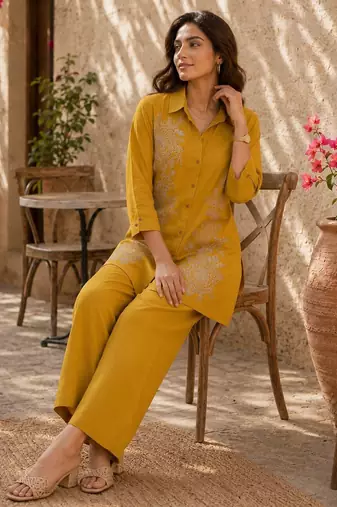 Women's yellow ethnic motif embroidered tunic with straight fit trousers