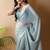 Turquoise poly georgette saree