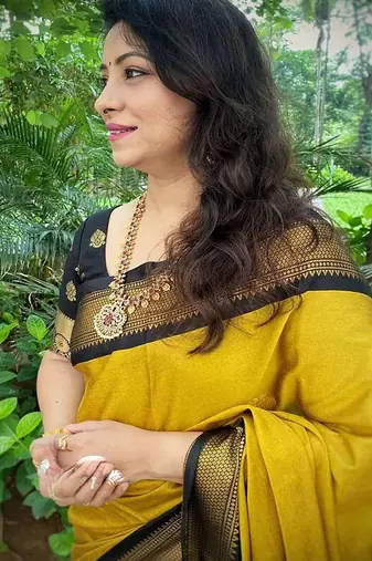 Yellow ethnic motifs zari kanjeevaram saree