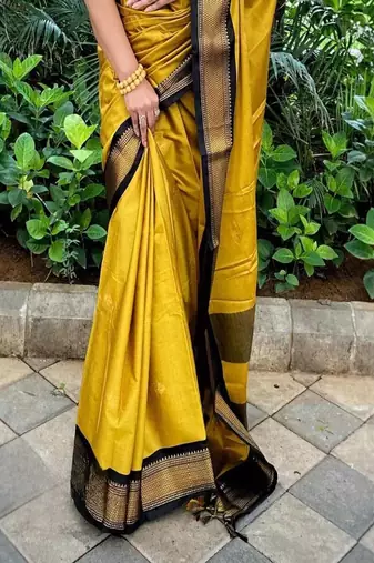 Yellow ethnic motifs zari kanjeevaram saree