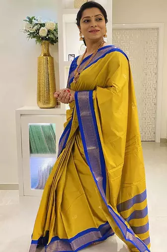 Yellow ethnic motifs zari kanjeevaram saree