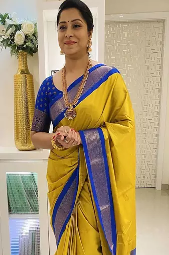 Yellow ethnic motifs zari kanjeevaram saree