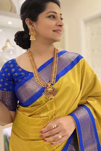 Yellow ethnic motifs zari kanjeevaram saree