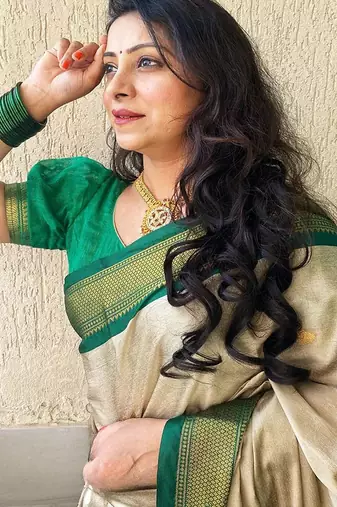Cream ethnic motifs zari kanjeevaram saree